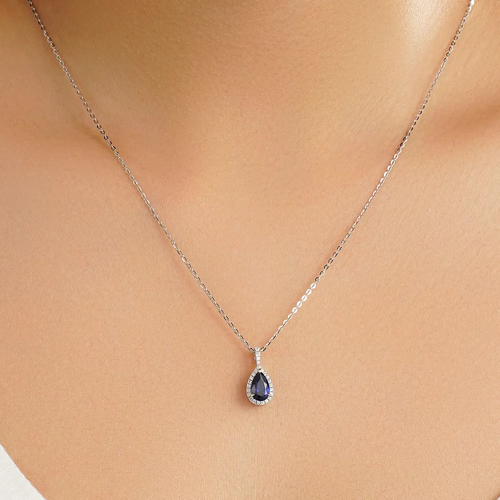 1 CT. Tanzanite Pear Shape Pendant with Pavé Diamond Halo